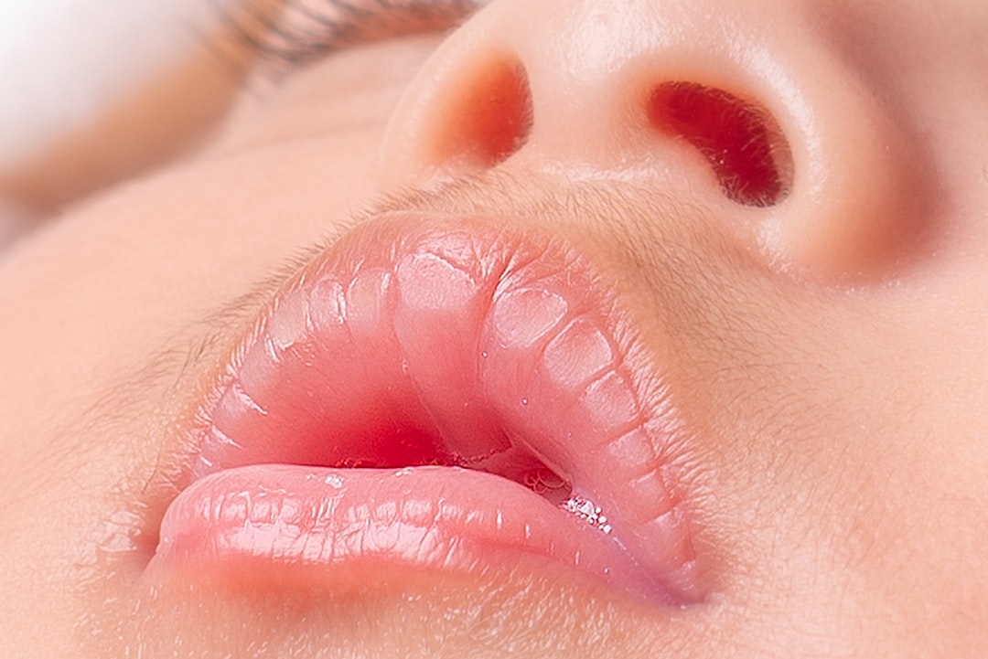 Close-up of a baby's lips and nose.