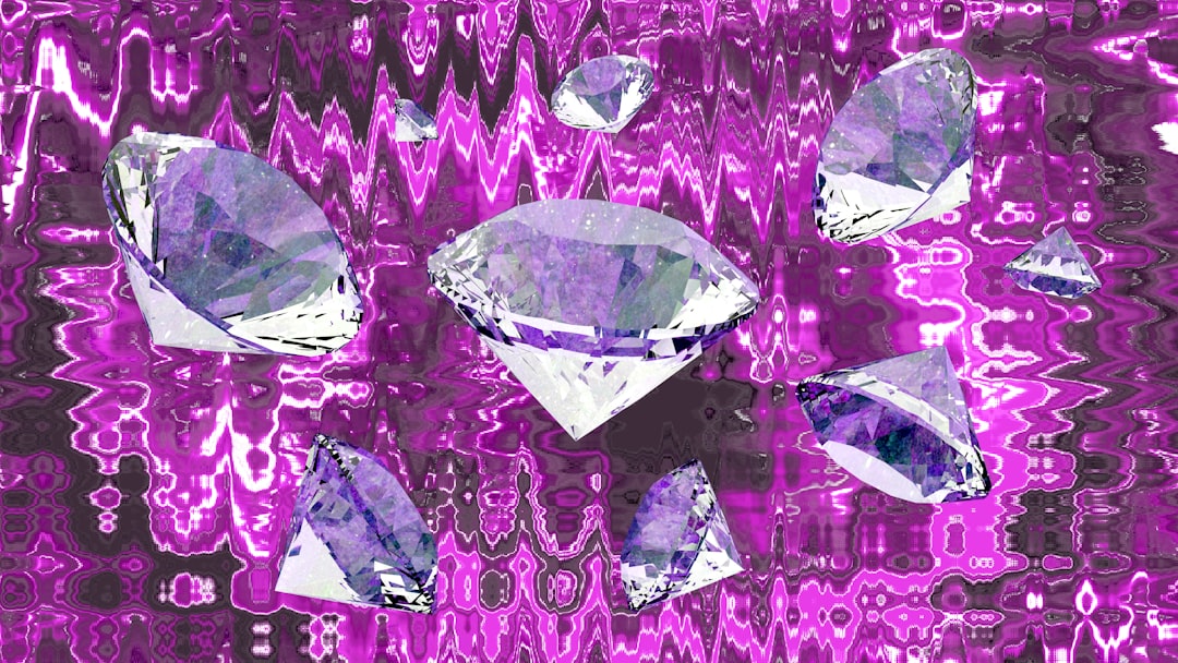 Several diamonds scattered on a vibrant purple background